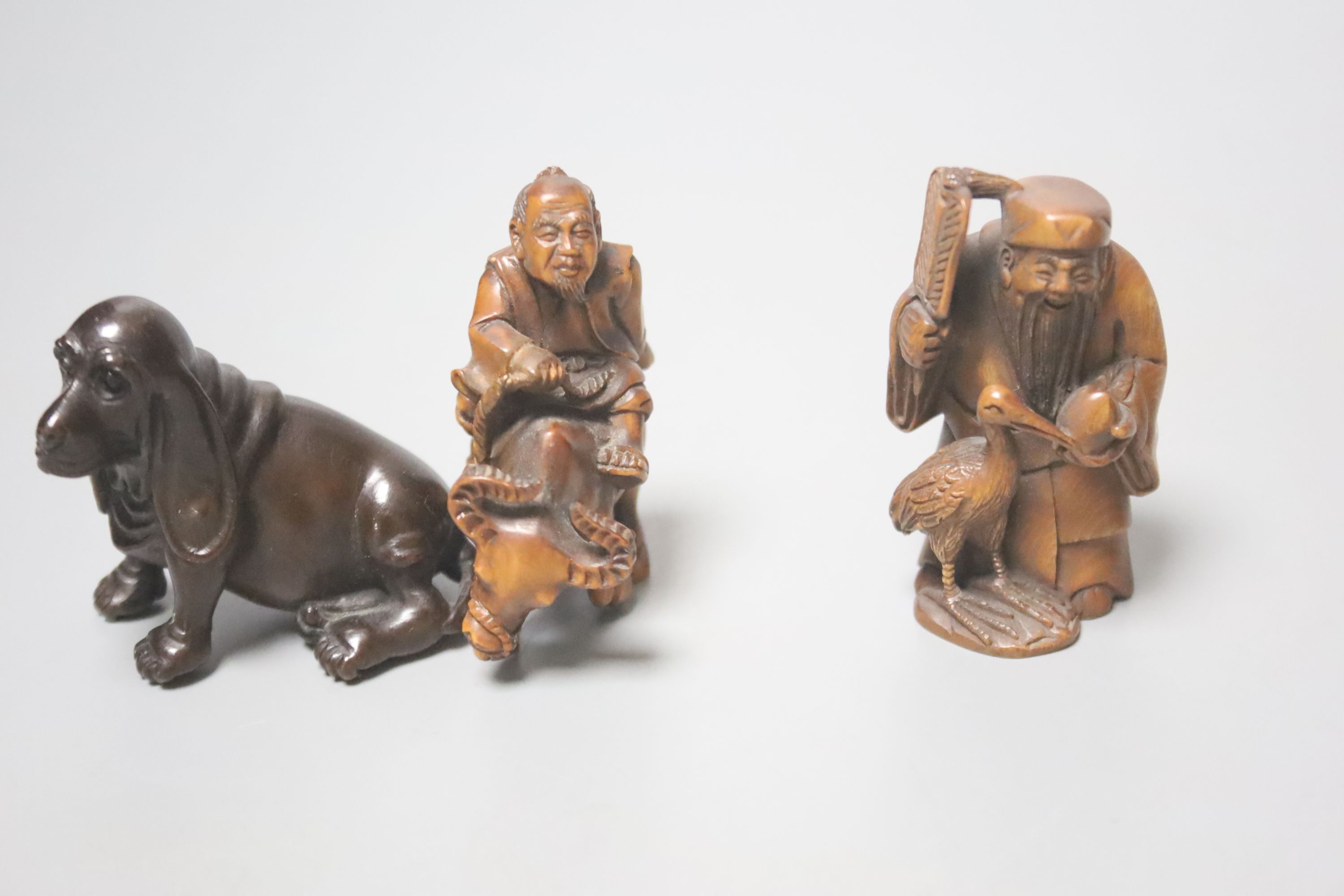 A collection of Japanese netsuke, mostly 20th century, one bronze